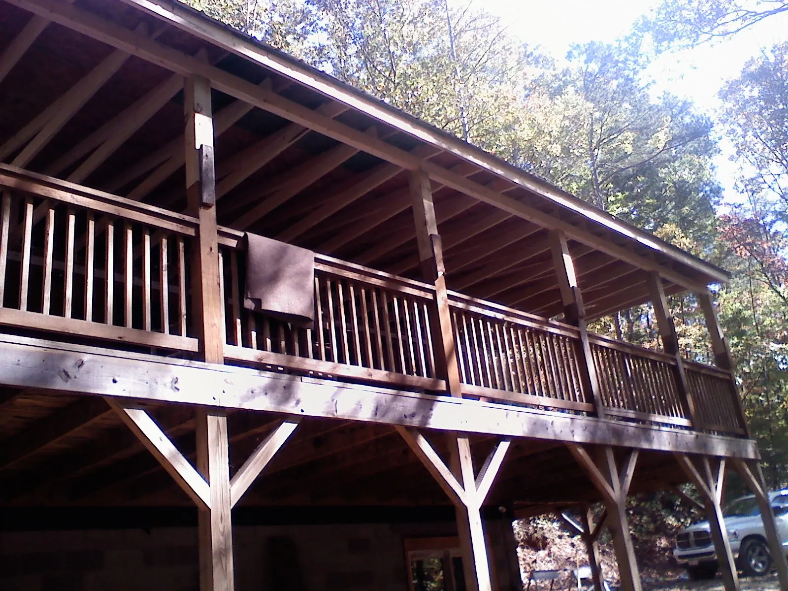 Timber framing under a new elevated porch and deck — Roof Leak Repair in Elliottsburg by Roofing Brothers